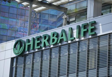 The Herbalife logo is seen on a building housing some of their offices in downtown Los Angeles, California April 28, 2013. REUTERS/Lucy Nich The Herbalife logo is seen on a building housing some of their offices in downtown Los Angeles, California April 28, 2013. REUTERS/Lucy Nich