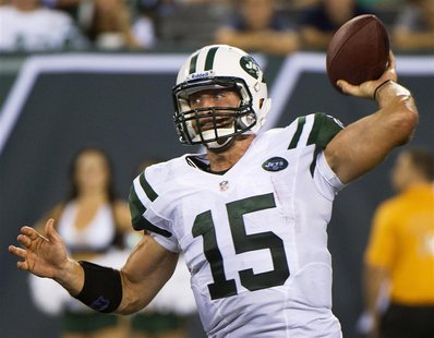 New York Jets quarterback Tim Tebow passes against the Carolina Panthers in the fourth quarter of their pre-season NFL football game in East New York Jets quarterback Tim Tebow passes against the Carolina Panthers in the fourth quarter of their pre-season NFL football game in East
