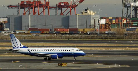 An Embraer ERJ-170 plane from United is seen at Newark Liberty International Airport in Newark, New Jersey November 15, 2012. REUTERS/Eduard An Embraer ERJ-170 plane from United is seen at Newark Liberty International Airport in Newark, New Jersey November 15, 2012. REUTERS/Eduard