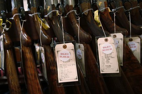 A row of shotguns are seen during the East Coast Fine Arms Show in Stamford, Connecticut, January 5, 2013. REUTERS/Carlo Allegri A row of shotguns are seen during the East Coast Fine Arms Show in Stamford, Connecticut, January 5, 2013. REUTERS/Carlo Allegri