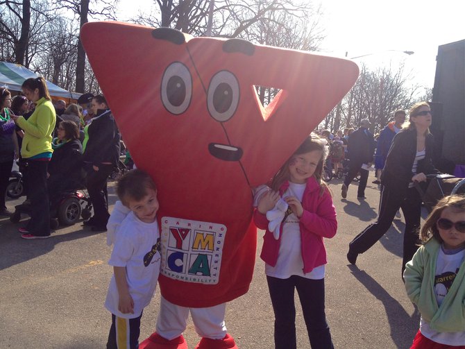 Stayin' healthy at the March with the YMCA Mascot!