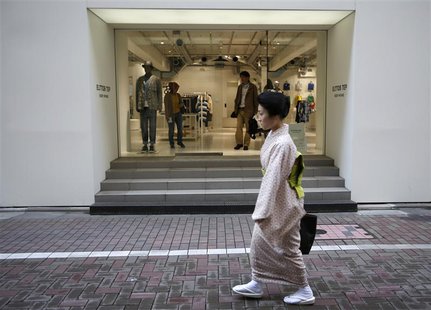 A kimono-clad woman walks in front of a luxury brand store at Tokyo's Ginza shopping district April 11, 2013. REUTERS/Issei Kato A kimono-clad woman walks in front of a luxury brand store at Tokyo's Ginza shopping district April 11, 2013. REUTERS/Issei Kato