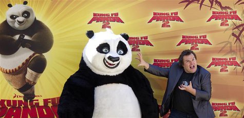 U.S. actor Jack Black poses with "Po", his character in "Kung Fu Panda 2", during a photocall to promote the movie at Madrid's zoo, June 10, U.S. actor Jack Black poses with "Po", his character in "Kung Fu Panda 2", during a photocall to promote the movie at Madrid's zoo, June 10,