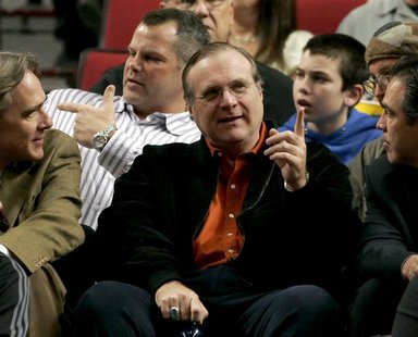 Portland Trail Blazers owner and billionaire Paul Allen (C) talks to the team president Steve Patterson (L) in front of fans during the team Portland Trail Blazers owner and billionaire Paul Allen (C) talks to the team president Steve Patterson (L) in front of fans during the team