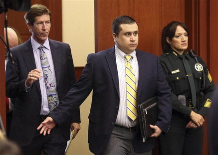 George Zimmerman, defendant in the killing of Trayvon Martin, arrives in Seminole circuit court in Sanford, Florida, with his attorney Mark George Zimmerman, defendant in the killing of Trayvon Martin, arrives in Seminole circuit court in Sanford, Florida, with his attorney Mark