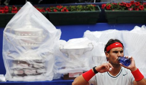 Spain's Rafael Nadal drinks during a break in play in his men's singles final match against compatriot Nicolas Almagro in the Barcelona Open Spain's Rafael Nadal drinks during a break in play in his men's singles final match against compatriot Nicolas Almagro in the Barcelona Open