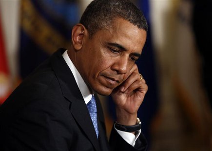 U.S. President Barack Obama is pictured as first lady Michelle Obama (not pictured) speaks during an event on finding employment for militar U.S. President Barack Obama is pictured as first lady Michelle Obama (not pictured) speaks during an event on finding employment for militar