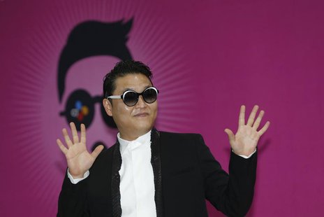 South Korean rapper Psy poses during a news conference before his concert in Seoul April 13, 2013. REUTERS/Lee Jae-Won South Korean rapper Psy poses during a news conference before his concert in Seoul April 13, 2013. REUTERS/Lee Jae-Won