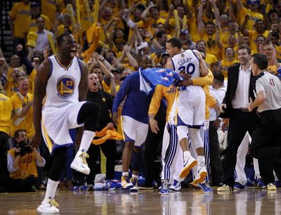 Golden State Warriors Stephen Curry (R) and Draymond Green celebrate against the Denver Nuggets during Game 4 of their NBA Western Division Golden State Warriors Stephen Curry (R) and Draymond Green celebrate against the Denver Nuggets during Game 4 of their NBA Western Division