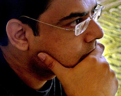 Indian author Ashok Banker pauses while talking about his debut film "Beautiful Ugly", to be released later this year, during an interview w Indian author Ashok Banker pauses while talking about his debut film "Beautiful Ugly", to be released later this year, during an interview w