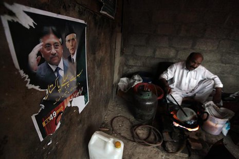 A poster of former President and head of the All Pakistan Muslim League (APML) political party Pervez Musharraf (L), with Muhammad Ali Jinna A poster of former President and head of the All Pakistan Muslim League (APML) political party Pervez Musharraf (L), with Muhammad Ali Jinna