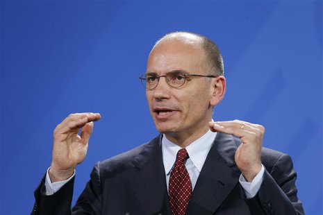 Italian Prime Minister Enrico Letta gestures as he addresses a joint news conference with German Chancellor Angela Merkel (not pictured) at Italian Prime Minister Enrico Letta gestures as he addresses a joint news conference with German Chancellor Angela Merkel (not pictured) at