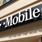 Signage for a T-Mobile store is pictured in downtown Los Angeles, California August 31, 2011. REUTERS/Fred Prouser
