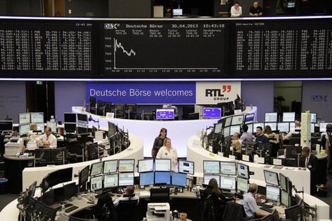 Traders work at their desks in front of the DAX board at the Frankfurt stock exchange April 30, 2013. REUTERS/Remote/Marte Kiessling Traders work at their desks in front of the DAX board at the Frankfurt stock exchange April 30, 2013. REUTERS/Remote/Marte Kiessling