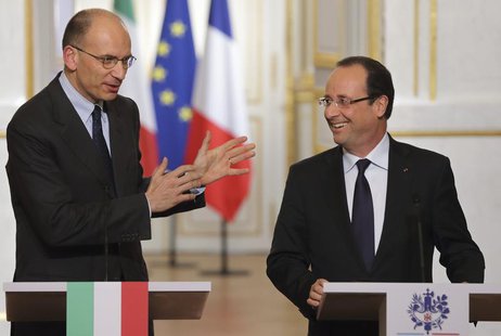 French President Francois Hollande (R) and new Italian Prime Minister Enrico Letta attend a joint news conference at the Elysee Palace in Pa French President Francois Hollande (R) and new Italian Prime Minister Enrico Letta attend a joint news conference at the Elysee Palace in Pa
