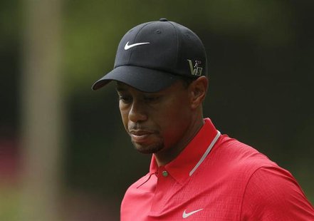 Tiger Woods of the U.S. walks to the 14th tee during final round play in the 2013 Masters golf tournament at the Augusta National Golf Club Tiger Woods of the U.S. walks to the 14th tee during final round play in the 2013 Masters golf tournament at the Augusta National Golf Club