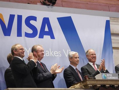 Visa CEO Charles Scharf (2nd R) and company executives ring the opening bell at the New York Stock Exchange, March 19, 2013. REUTERS/Brendan Visa CEO Charles Scharf (2nd R) and company executives ring the opening bell at the New York Stock Exchange, March 19, 2013. REUTERS/Brendan