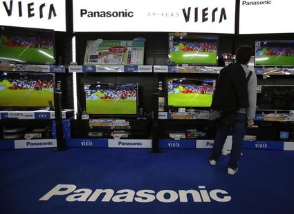 A man looks at Panasonic Corp's Viera televisions displayed at an electronics store in Tokyo March 28, 2013. REUTERS/Yuya Shino A man looks at Panasonic Corp's Viera televisions displayed at an electronics store in Tokyo March 28, 2013. REUTERS/Yuya Shino