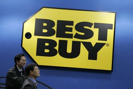 Customers walk past a Best Buy logo on the opening day of China's first Best Buy outlet in Shanghai December 28, 2006. REUTERS/Aly Song Customers walk past a Best Buy logo on the opening day of China's first Best Buy outlet in Shanghai December 28, 2006. REUTERS/Aly Song