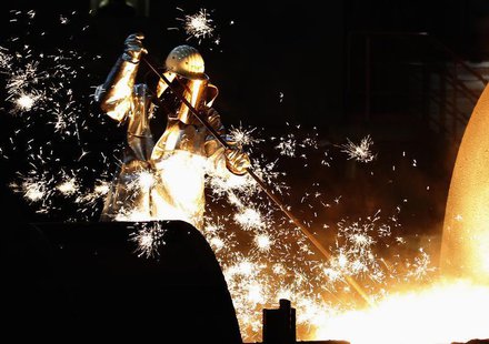 A worker controls a tapping of a blast furnace at Europe's largest steel factory of Germany's industrial conglomerate ThyssenKrupp AG in the A worker controls a tapping of a blast furnace at Europe's largest steel factory of Germany's industrial conglomerate ThyssenKrupp AG in the