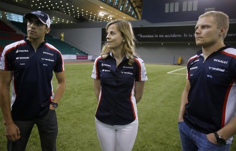 Williams Formula One drivers Pastor Maldonado (L) of Venezuela, Valtteri Bottas (R) of Finland and test-driver Susie Wolff of Britain visit Williams Formula One drivers Pastor Maldonado (L) of Venezuela, Valtteri Bottas (R) of Finland and test-driver Susie Wolff of Britain visit