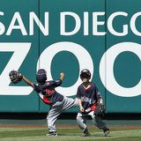Unidentified children of National League All-Stars play in the outfield during practice for Major League Baseball's All-Star Game in Anaheim