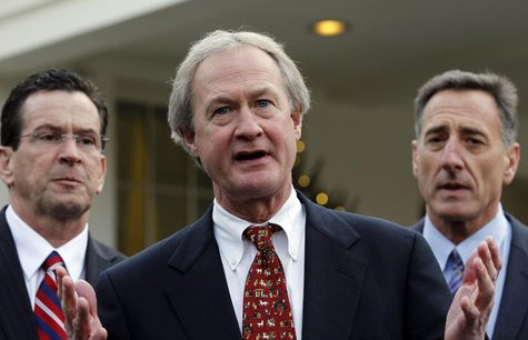 Newly elected Rhode Island Governor Lincoln Chafee (C) speaks to the media between other Governors-elect Dan Malloy of Connecticut (L) and P Newly elected Rhode Island Governor Lincoln Chafee (C) speaks to the media between other Governors-elect Dan Malloy of Connecticut (L) and P