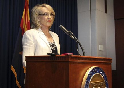 Arizona Governor Jan Brewer addresses the media about the Supreme Court's decision on SB1070 in Phoenix, Arizona, June 25, 2012. REUTERS/Dar Arizona Governor Jan Brewer addresses the media about the Supreme Court's decision on SB1070 in Phoenix, Arizona, June 25, 2012. REUTERS/Dar