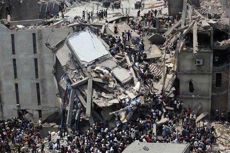 People rescue garment workers trapped under rubble at the Rana Plaza building after it collapsed, in Savar, 30 km (19 miles) outside Dhaka, People rescue garment workers trapped under rubble at the Rana Plaza building after it collapsed, in Savar, 30 km (19 miles) outside Dhaka,