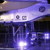 A man walks below the Solar Impulse aircraft at Moffett Field in Mountain View, California March 28, 2013. REUTERS/Robert Galbraith A man walks below the Solar Impulse aircraft at Moffett Field in Mountain View, California March 28, 2013. REUTERS/Robert Galbraith