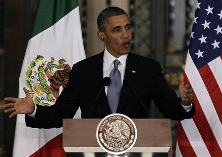 U.S President Barack Obama speaks beside Mexico's President Enrique Pena Nieto (not pictured) during a news conference after attending a bil U.S President Barack Obama speaks beside Mexico's President Enrique Pena Nieto (not pictured) during a news conference after attending a bil