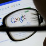 A Google search page is seen through the spectacles of a computer user in Leicester, central England July 20, 2007. REUTERS/Darren Staples A Google search page is seen through the spectacles of a computer user in Leicester, central England July 20, 2007. REUTERS/Darren Staples