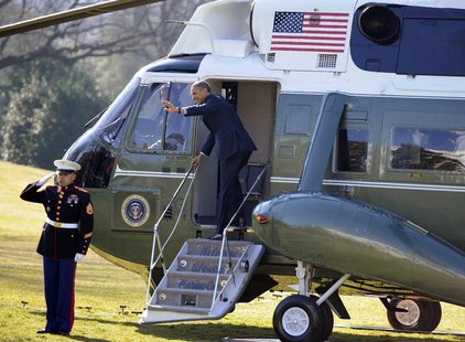 U.S. President Barack Obama waves to visitors as he steps aboard Marine One for departure from the White House, Washington February 14, 2013 U.S. President Barack Obama waves to visitors as he steps aboard Marine One for departure from the White House, Washington February 14, 2013
