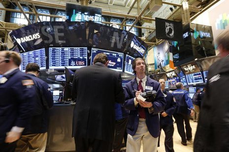 Traders work on the floor at the New York Stock Exchange, April 30, 2013. REUTERS/Brendan McDermid Traders work on the floor at the New York Stock Exchange, April 30, 2013. REUTERS/Brendan McDermid