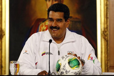 Venezuela's President Nicolas Maduro smiles during a news conference with Venezuela's Under-17 soccer team in Caracas April 30, 2013. REUTER Venezuela's President Nicolas Maduro smiles during a news conference with Venezuela's Under-17 soccer team in Caracas April 30, 2013. REUTER