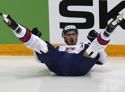 Slovakia's Miroslav Satan celebrates his scoring during their 2012 IIHF men's ice hockey World Championship semi-final game with Czech Repub Slovakia's Miroslav Satan celebrates his scoring during their 2012 IIHF men's ice hockey World Championship semi-final game with Czech Repub
