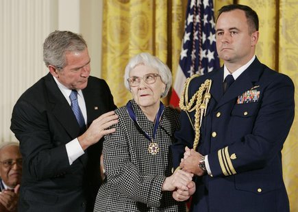 U.S. President George W. Bush (L) awards the Presidential Medal of Freedom to American novelist Harper Lee (C) in the East Room of the White U.S. President George W. Bush (L) awards the Presidential Medal of Freedom to American novelist Harper Lee (C) in the East Room of the White