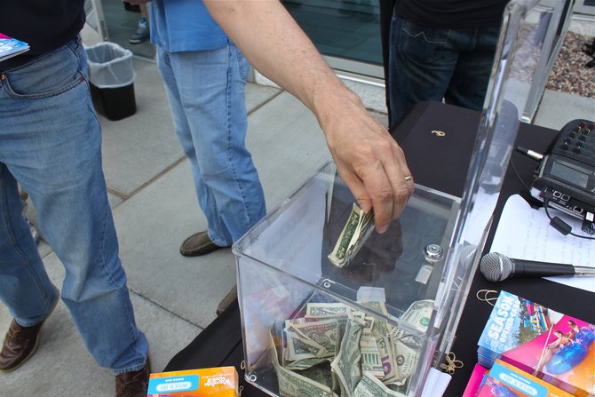 Generous people donating money for the WIXX Christmas Wish..THANK YOU!!