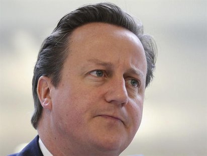 Britain's Prime Minister David Cameron listens during a meeting with scientists before opening the 'Li Ka-shing Centre for Health Informatio Britain's Prime Minister David Cameron listens during a meeting with scientists before opening the 'Li Ka-shing Centre for Health Informatio