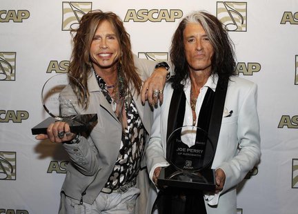 Steven Tyler (L) and Joe Perry of the group Aerosmith pose with the ASCAP Founders Award during a photo opportunity in Los Angeles April 8, Steven Tyler (L) and Joe Perry of the group Aerosmith pose with the ASCAP Founders Award during a photo opportunity in Los Angeles April 8,