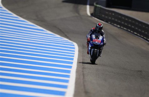 Yamaha MotoGP rider Jorge Lorenzo of Spain rides his bike during the second qualifying race at the Spanish Grand Prix in Jerez de la Fronter Yamaha MotoGP rider Jorge Lorenzo of Spain rides his bike during the second qualifying race at the Spanish Grand Prix in Jerez de la Fronter