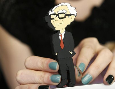 A Berkshire Hathaway souvenir USB memory stick cartoon figure of Berkshire Hathaway CEO Warren Buffett is for sale at a cocktail reception h A Berkshire Hathaway souvenir USB memory stick cartoon figure of Berkshire Hathaway CEO Warren Buffett is for sale at a cocktail reception h