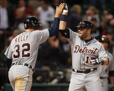 HEROES IN HOUSTON MEET: Detroit Tigers C Alex Avila (R) is congratulated by OF Don Kelly (L) after hitting a two-run homer in the ninth inning of Detroit's 4-3 victory over Houston at Houston's Minute Maid Park on May 3, 2013. Kelly singled home the go-ahead run in a 14-inning, 7-3 victory over the Astros the night before. (photo courtesy Detroit Tigers) HEROES IN HOUSTON MEET: Detroit Tigers C Alex Avila (R) is congratulated by OF Don Kelly (L) after hitting a two-run homer in the ninth inning of Detroit's 4-3 victory over Houston at Houston's Minute Maid Park on May 3, 2013. Kelly singled home the go-ahead run in a 14-inning, 7-3 victory over the Astros the night before. (photo courtesy Detroit Tigers)