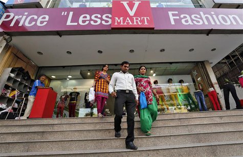 Customers exit a V-Mart retail store in New Delhi April 6, 2013. Picture taken April 6, 2013. REUTERS/Adnan Abidi Customers exit a V-Mart retail store in New Delhi April 6, 2013. Picture taken April 6, 2013. REUTERS/Adnan Abidi
