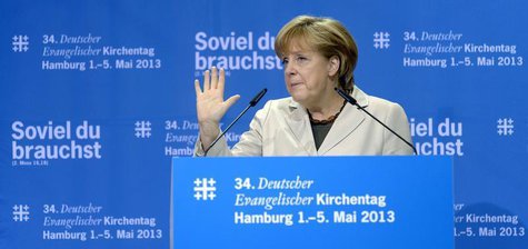 German Chancellor Angela Merkel delivers her speech during her visit to the Protestant Church Congress Kirchentag in Hamburg, May 3, 2013. R German Chancellor Angela Merkel delivers her speech during her visit to the Protestant Church Congress Kirchentag in Hamburg, May 3, 2013. R