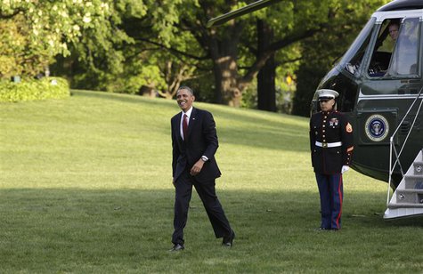 U.S. President Barack Obama smiles as he walks on the South Lawn of the White House upon his return to Washington from Costa Rica May 4, 201 U.S. President Barack Obama smiles as he walks on the South Lawn of the White House upon his return to Washington from Costa Rica May 4, 201
