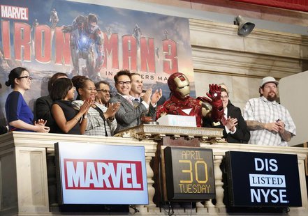 Actor Robert Downey Jr. (C) and Marvel Comics representatives ring the opening bell at the New York Stock Exchange to promote his new movie Actor Robert Downey Jr. (C) and Marvel Comics representatives ring the opening bell at the New York Stock Exchange to promote his new movie