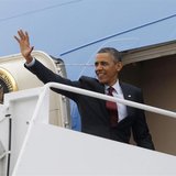 U.S. President Barack Obama waves from the Air Force One at Andrews Air Force Base near Washington, May 5, 2013. REUTERS/Jason Reed