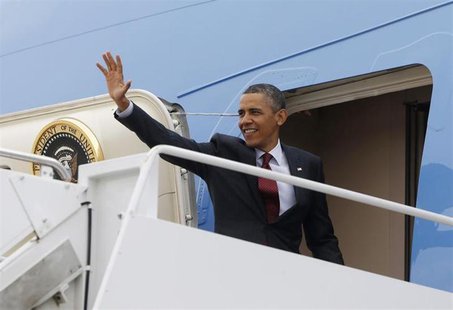 U.S. President Barack Obama waves from the Air Force One at Andrews Air Force Base near Washington, May 5, 2013. REUTERS/Jason Reed U.S. President Barack Obama waves from the Air Force One at Andrews Air Force Base near Washington, May 5, 2013. REUTERS/Jason Reed
