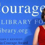 2013 John F. Kennedy Profile in Courage Award recipient, former U.S. congresswoman Gabrielle Giffords, listens as her husband Mark Kelly spe 2013 John F. Kennedy Profile in Courage Award recipient, former U.S. congresswoman Gabrielle Giffords, listens as her husband Mark Kelly spe